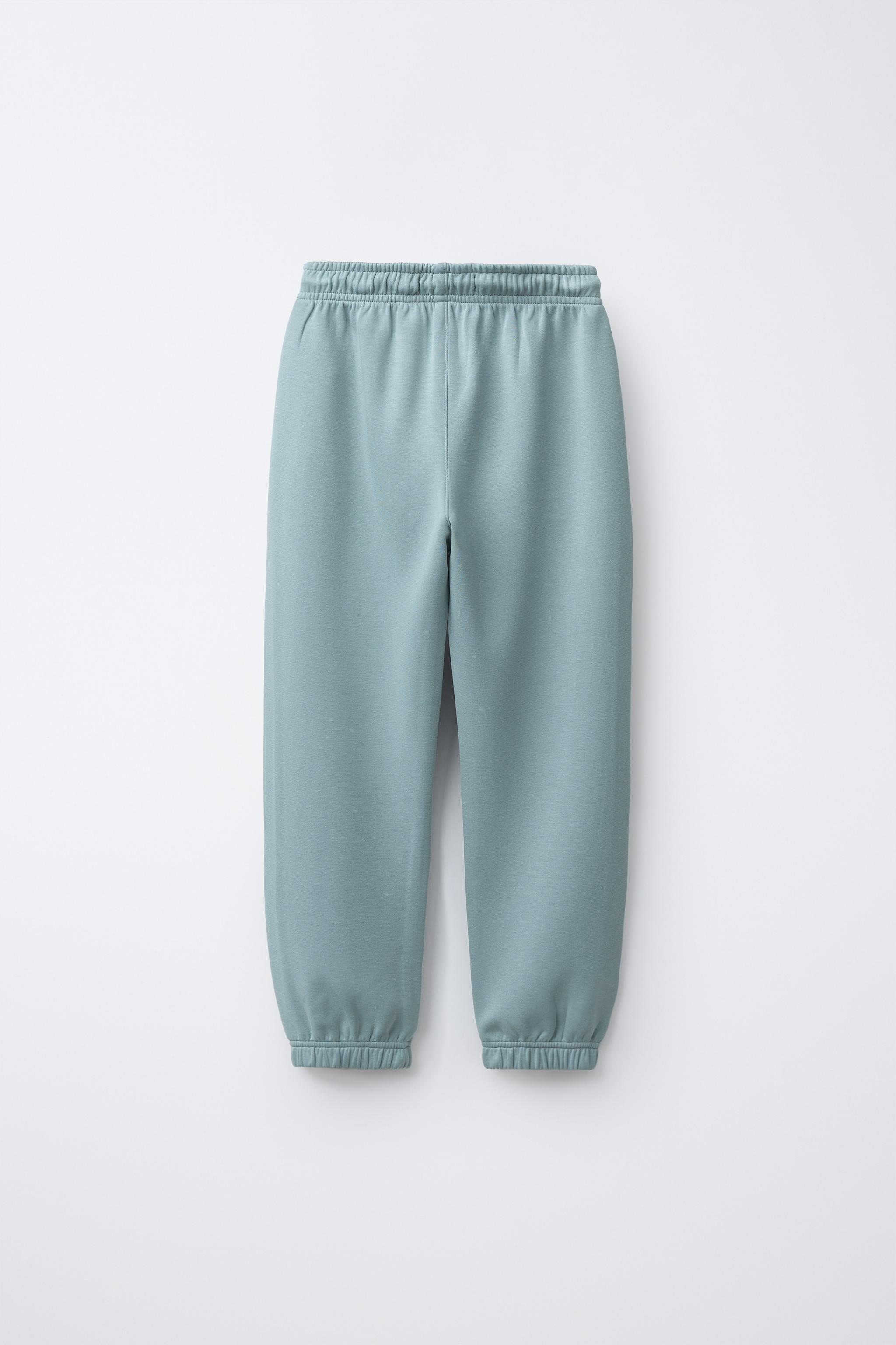 PANTALON JOGGER SPORTY ÉTIQUETTE GOMMÉE